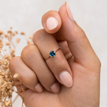 Timeless Blue Topaz Solitaire Ring in 92.5 Sterling Silver