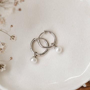 Elegant Pearl Huggies Earrings in Sterling Silver